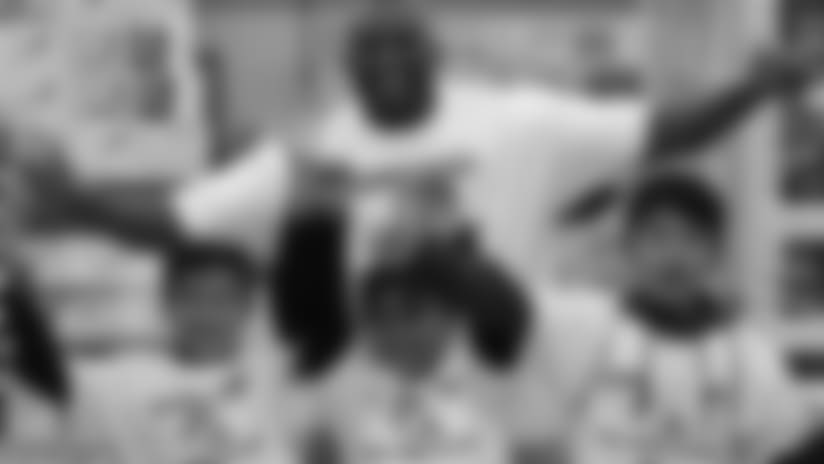 Corey Liuget Continues Antonio Gates' Holiday Tradition