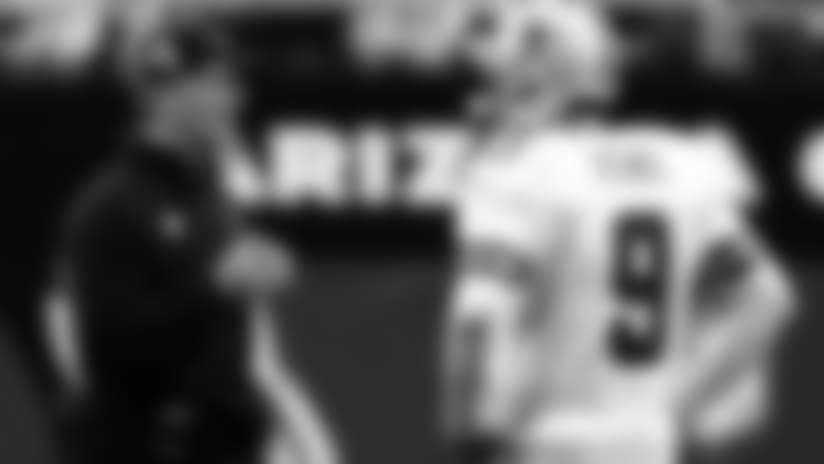 Cowboys HC Jason Garrett and QB Tony Romo