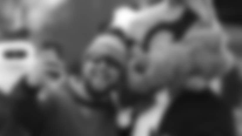 Tennessee Titans fan Guy Fogg takes a selfie with Titans mascot T-Rac before an NFL football game between the Titans and the Los Angeles Rams Sunday, Dec. 24, 2017, in Nashville, Tenn. (AP Photo/James Kenney)