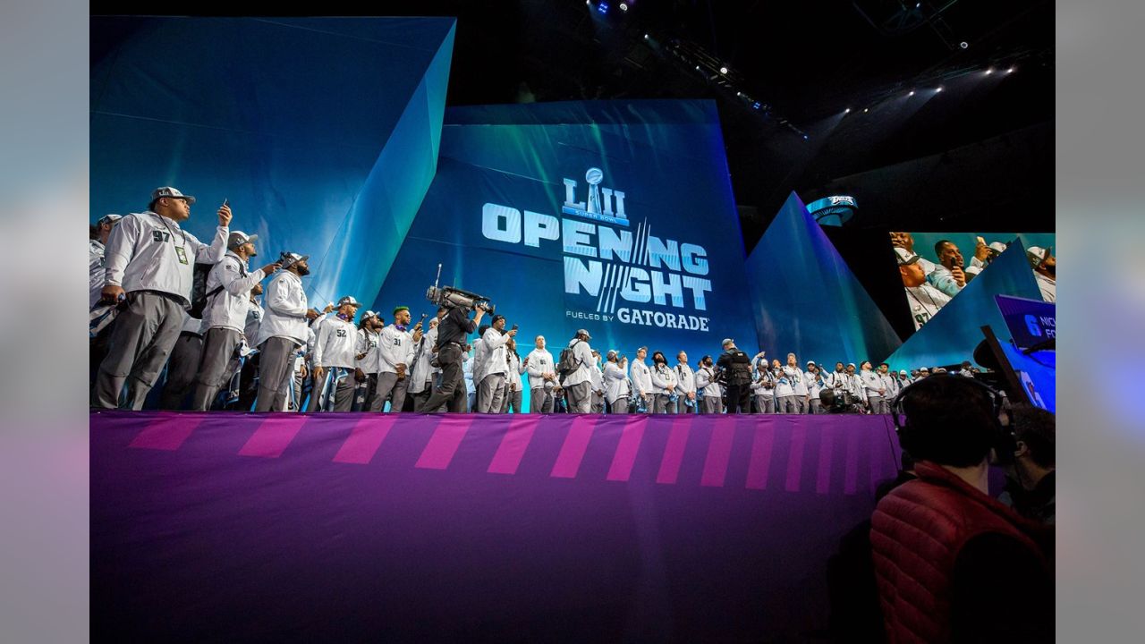 The Philadelphia Eagles players walk out on stage during Super Bowl Opening Night.