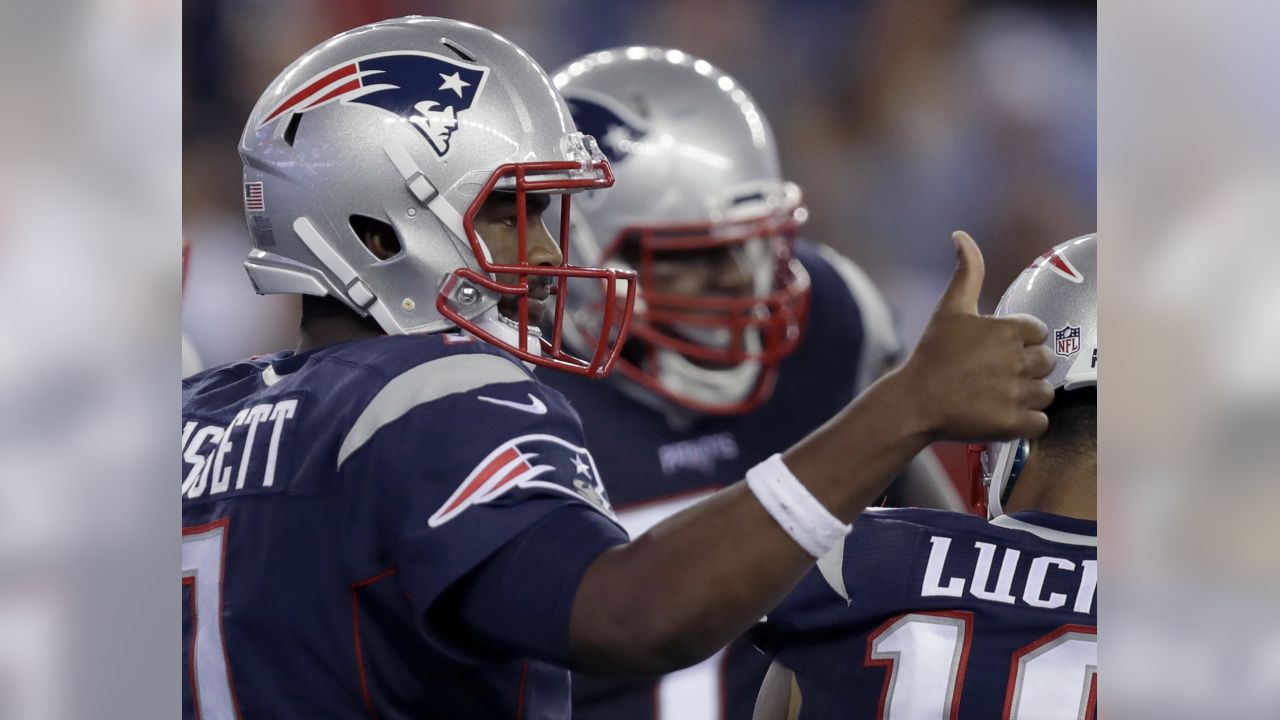 Tampa Bay Buccaneers quarterback Tom Brady (12) puts on his helmet during  the second half of an NFL football game against the New England Patriots,  Sunday, Oct. 3, 2021, in Foxborough, Mass. (