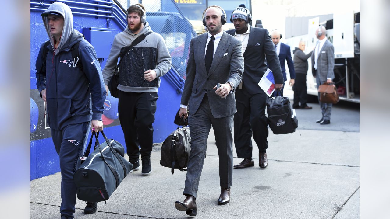 New England Patriots quarterback Brian Hoyer, center, arrives at New Era Field prior to an NFL football game against the Buffalo Bills, Sunday, Dec. 3, 2017, in Orchard Park, N.Y. (AP Photo/Rich Barnes)