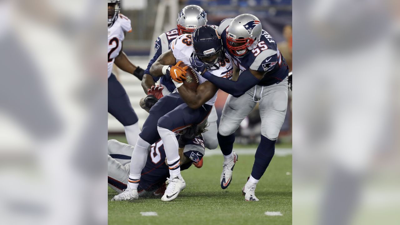 New England Patriots V'Angelo Bentley (9) tries to elude Chicago Bears'  Jacquizz Rodgers (35) during a kick return during the first half of a  preseason NFL football game Thursday, Aug. 18, 2016