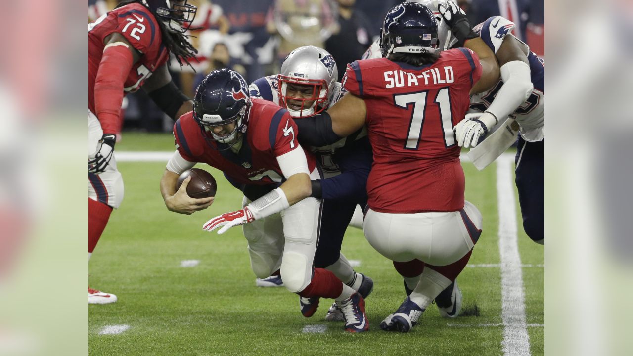 Houston Texans quarterback Brian Hoyer (7) is sacked by New England Patriots  defensive tackle Dominique Easley (99) during the first half at NRG  Stadium. The Patriots defeated the Texans 27-6. Man …