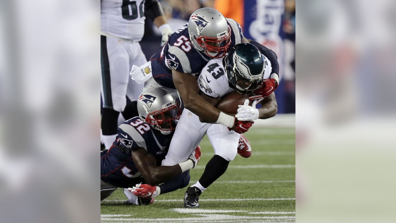 Philadelphia Eagles' Darren Sproles (43) is tackled by Jacksonville Jaguars'  Alan Ball (23) after rushing for a touchdown during the second half of an  NFL football game, Sunday, Sept. 7, 2014, in