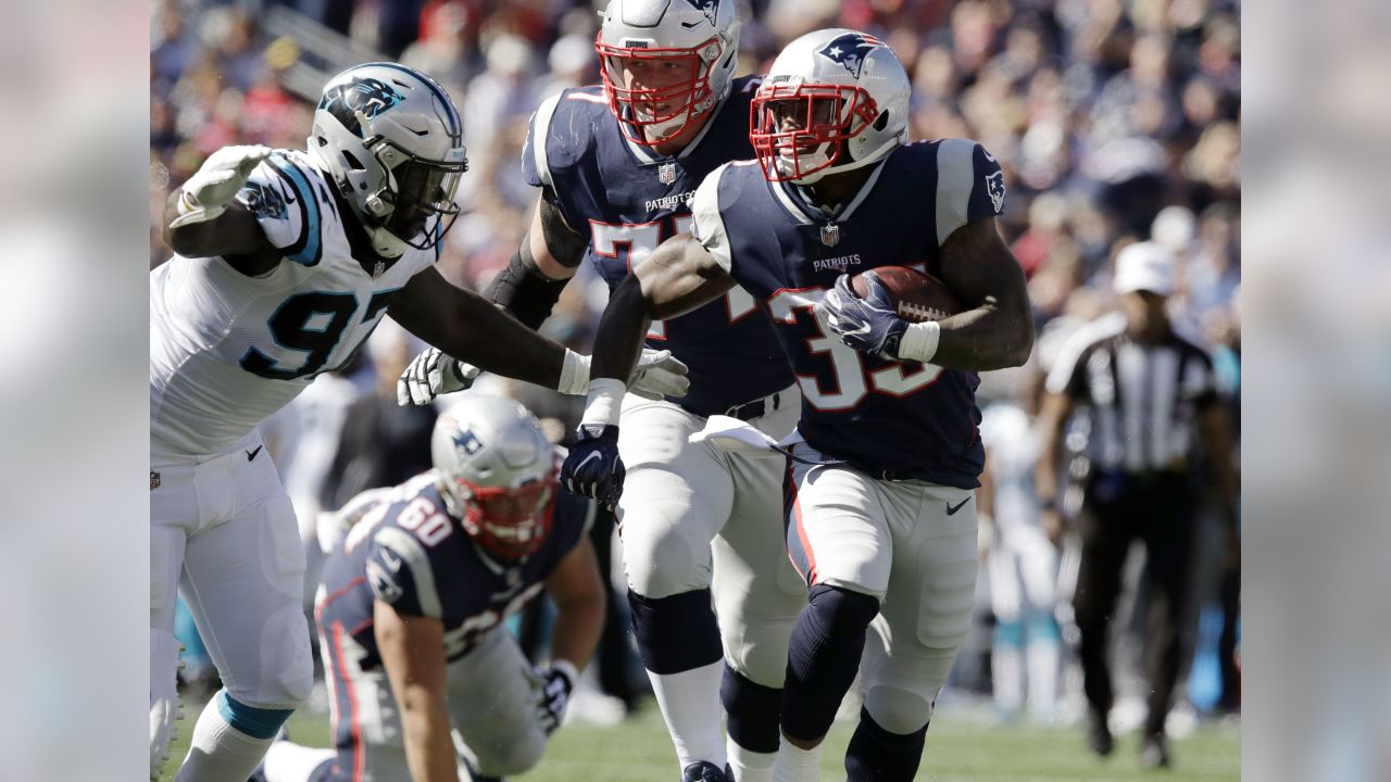 Carolina Panthers running back Fozzy Whittaker, foreground, celebrates his  touchdown against the New England Patriots with Christian McCaffrey, left,  during the first half of an NFL football game, …