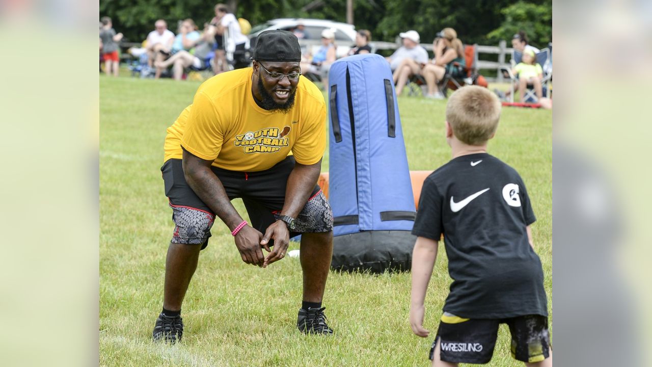 Teaching Football And Touching Hearts