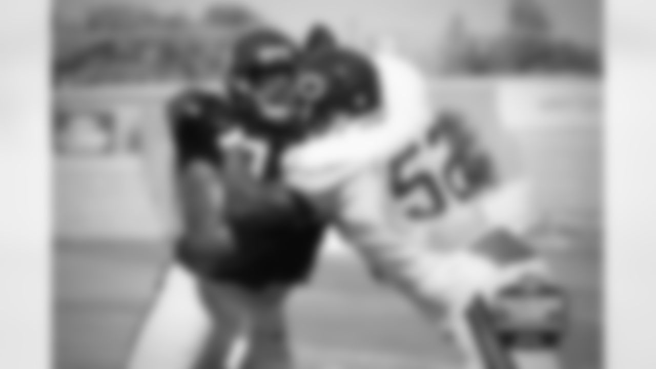 OL Bobby Massie (70) and LB Christian Jones (52).