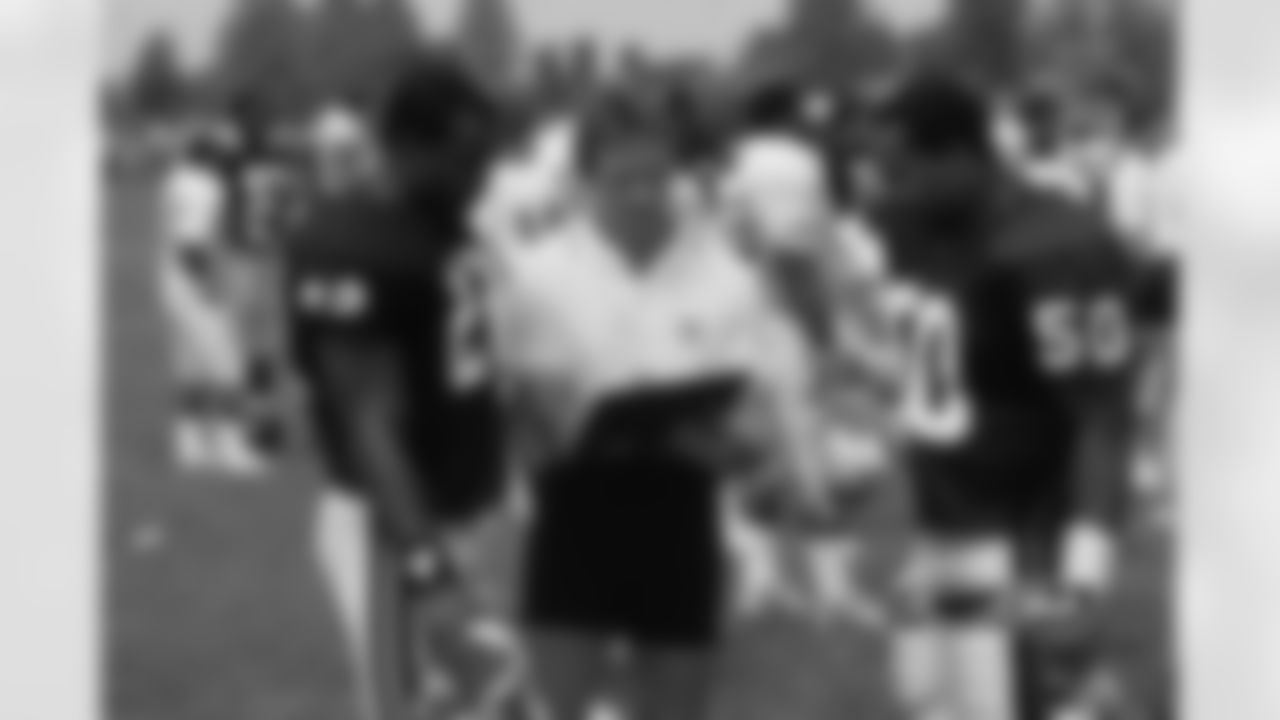 Dave Duerson, Dave McGinnis and Mike Singletary.