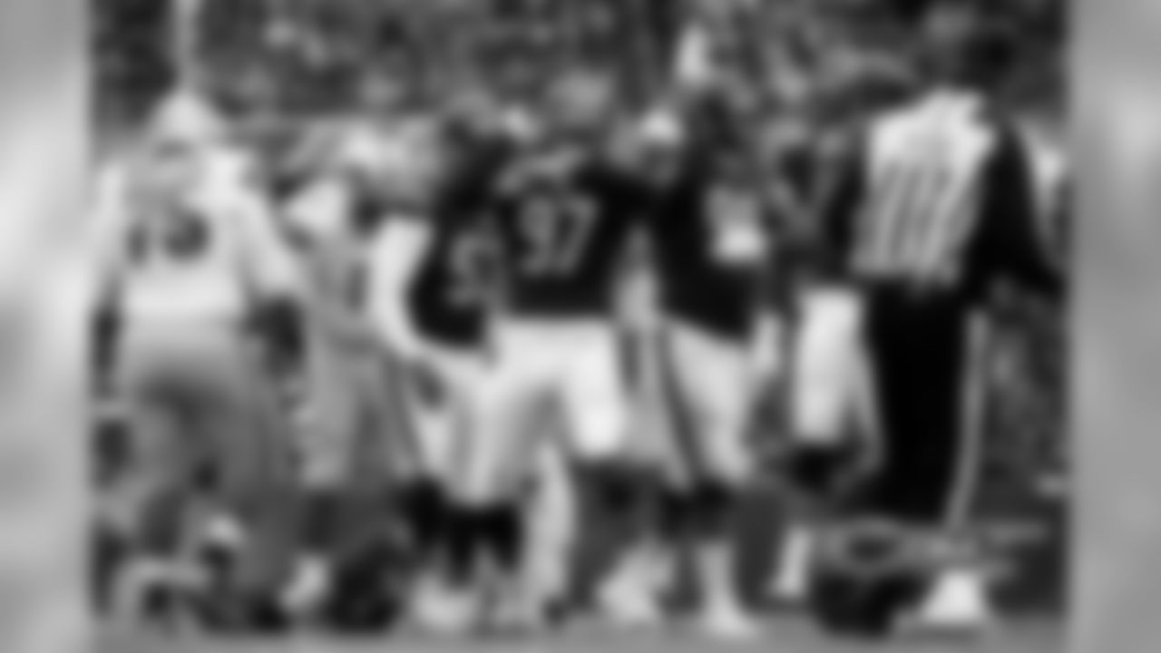 LB Willie Young (97), LB John Timu (53) and LB Lamarr Houston (99).