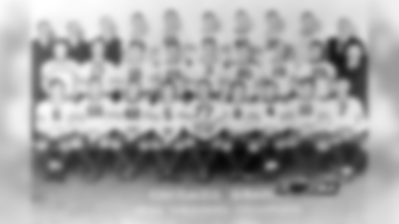 Nagurski 4. Molesworth 5. Corbett 6. Ronzani 7. Sisk 8. Brumbaugh 10. Manders 11. Buss 12. Lyman 16. Musso 17. Zeller 19. Kawal 20. Carlson 22. Carr 25. Kiesling 26. Pearson 29. Kopcha 33. Masterson 47. Rosequist 48. Feathers 56. Hewitt 76. Miller 77. Grange George Halas - Head Coach