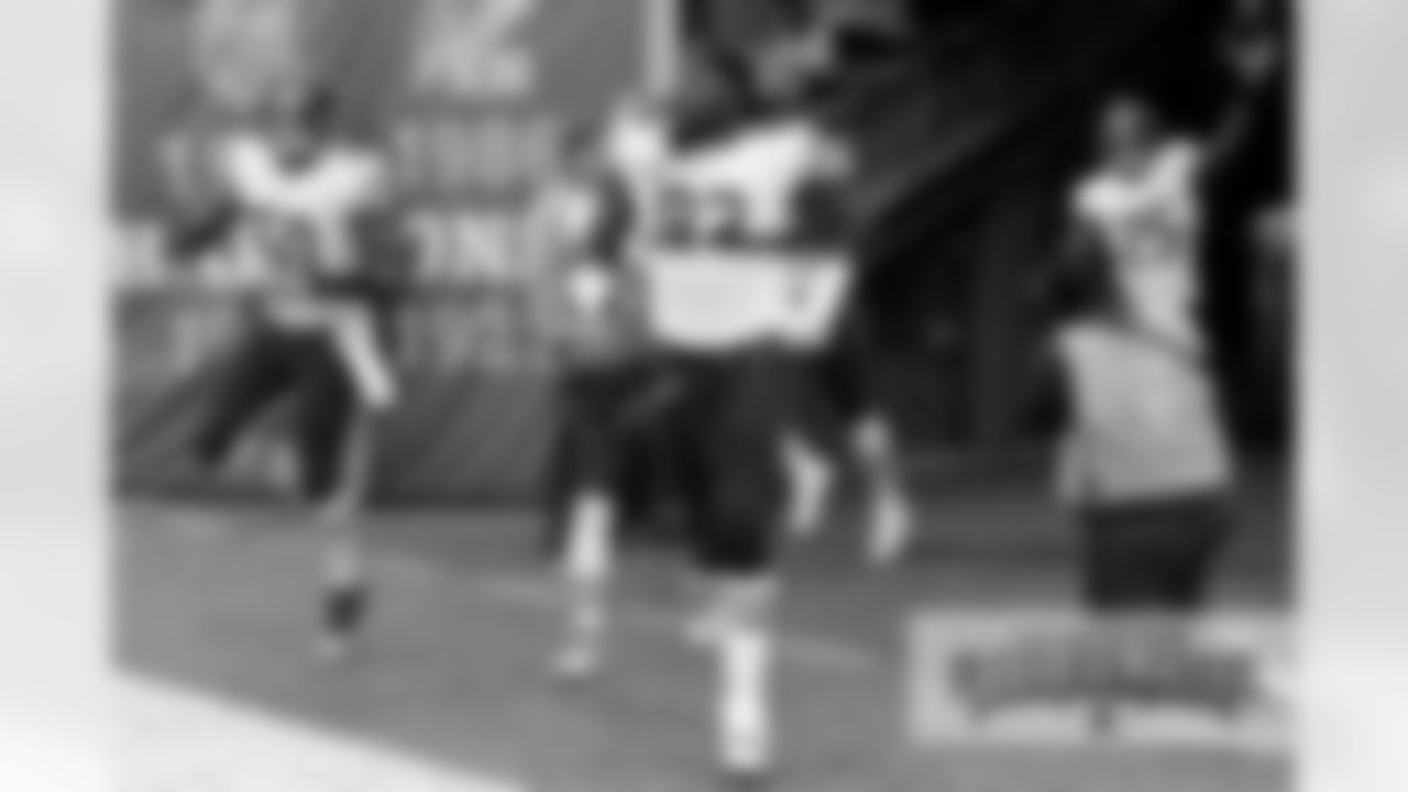 LB Jerrell Freeman (50), LB Pernell McPhee (92) and RB Ka'Deem Carey (25).