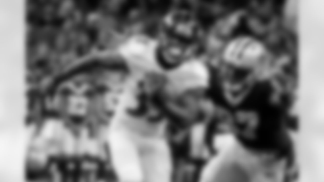 RB Taquan Mizzell