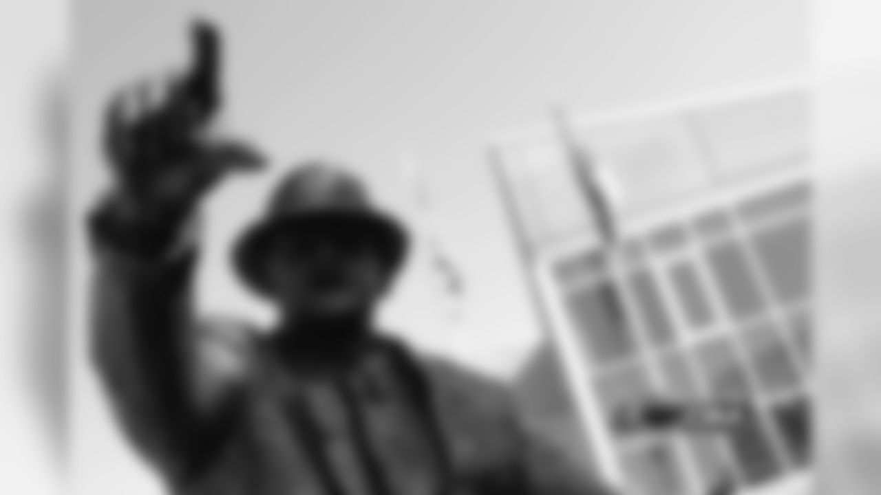 The pointing of George Halas' finger outward from the building was the chosen pose by owner Virginia McCaskey to be as if George Halas is saying, "Let's go get 'em."