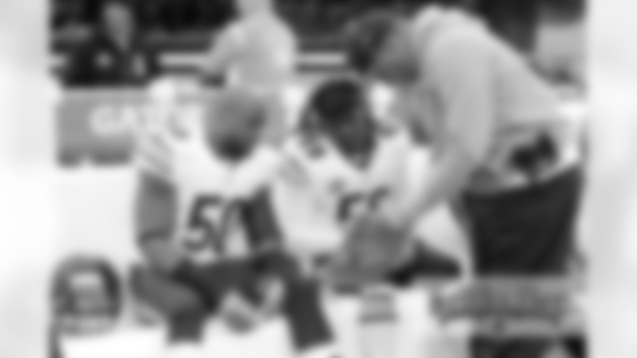 ILB Jerrell Freeman (50), ILB Danny Trevathan (59) and Inside Linebackers Coach Glenn Pires.