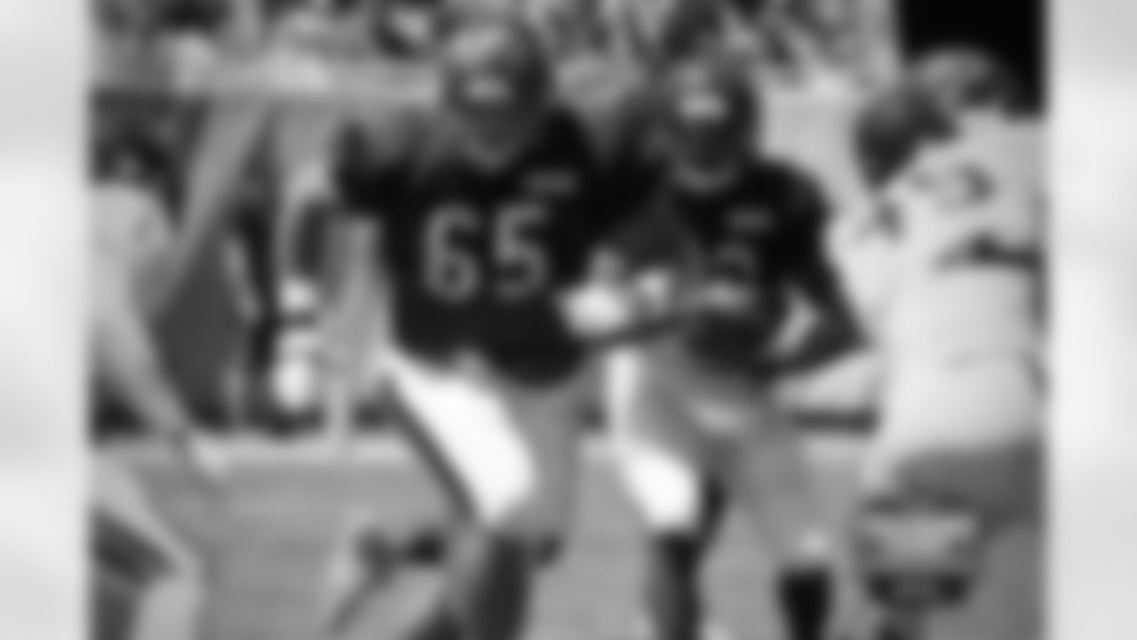 OL Cody Whitehair (65) and RB Jeremy Langford (33).