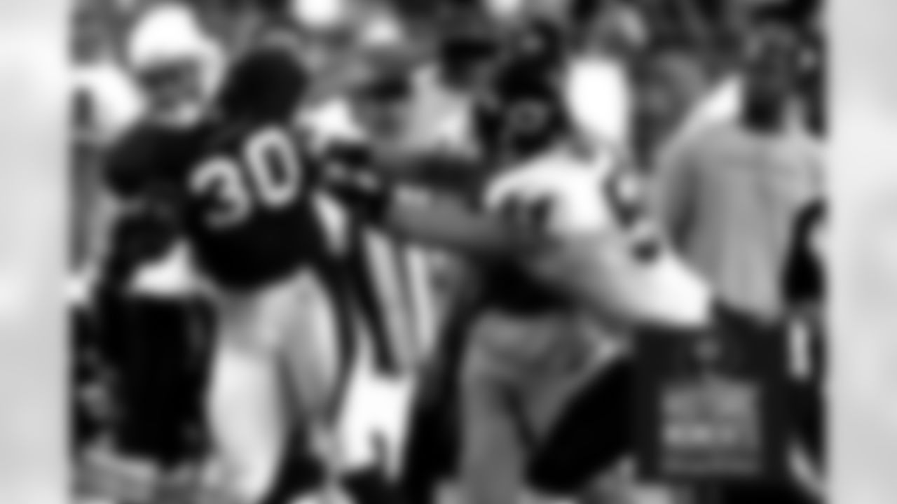 Brian Urlacher knocks Cardinals' Obafemi Ayanbadejo out of bounds in the fourth quarter. Bears Historic Moments - Chicago Tribune