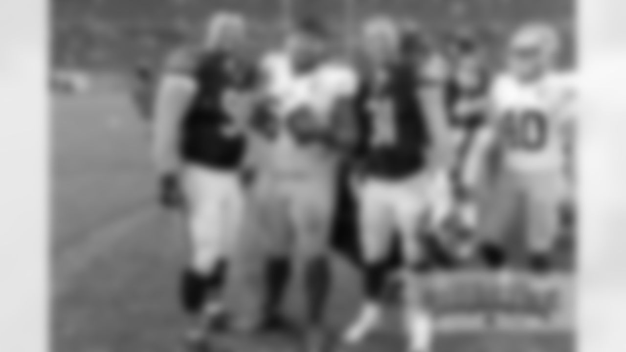 All Wyoming alums. Bears DE Mitch Unrein (left), 49ers NT Mike Purcell (middle) and Bears S Chris Prosinski (right).