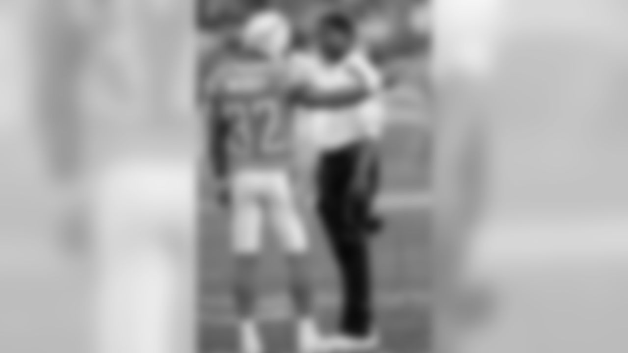 Wilks in 2011 with Chargers S Eric Weddle