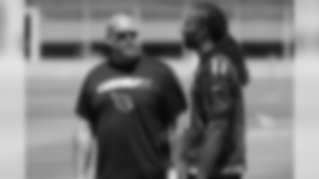 GM Steve Keim (left) with WR Larry Fitzgerald