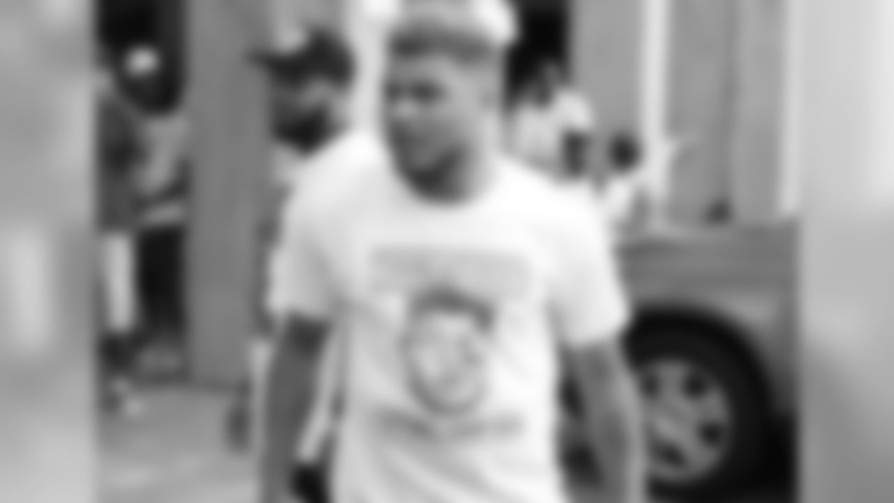 Mathieu shows off the camp T-shirt