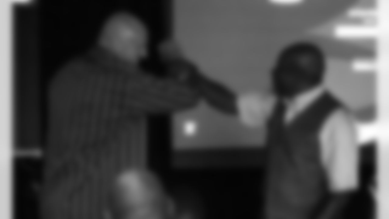 Mark Walczak greets Roy Green