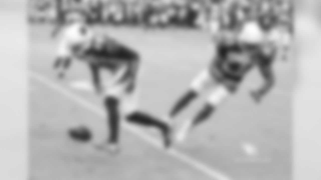 CB Justin Bethel (left) and S Antoine Bethea while going for an interception