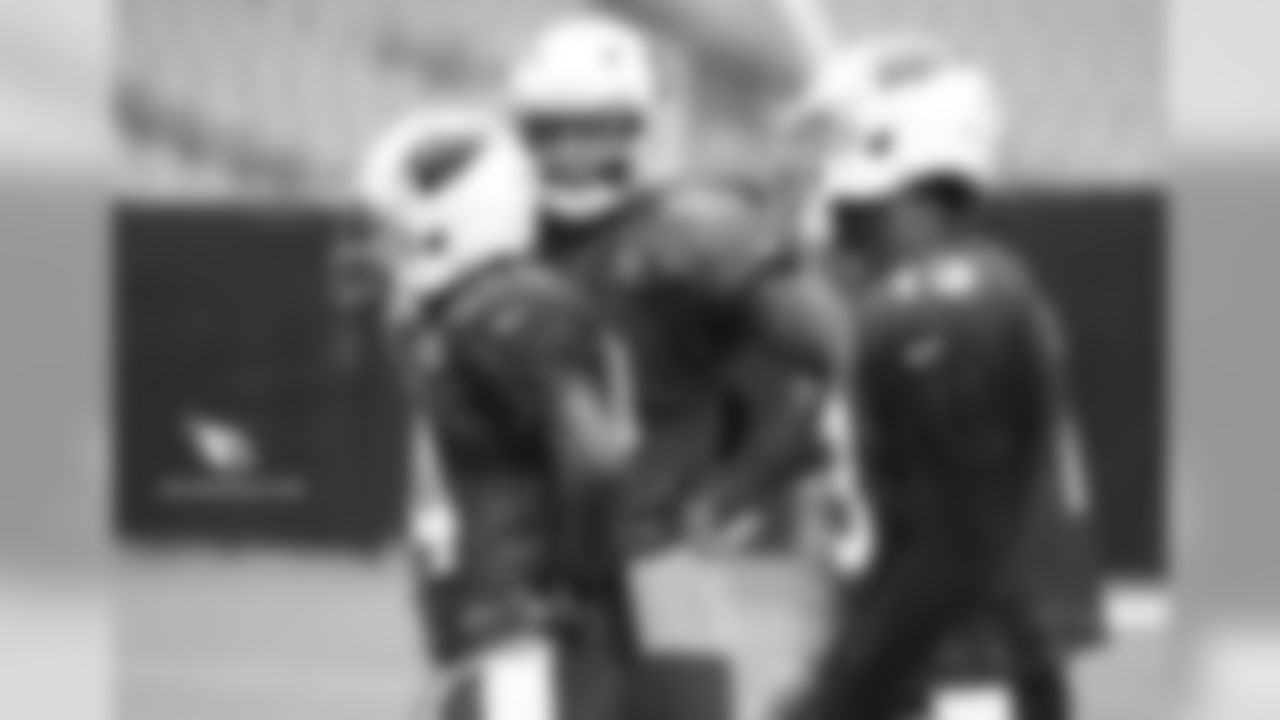 WR Carlton Agudosi smiles early in practice but was injured later