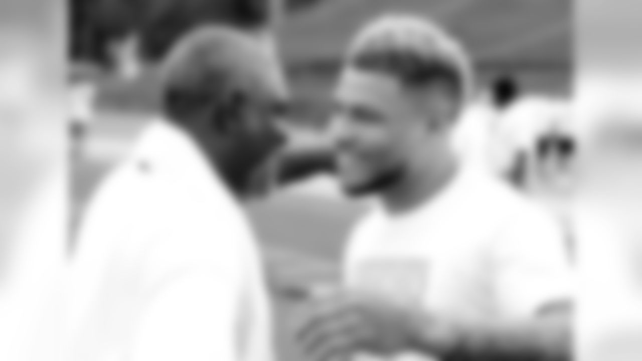 Mathieu hugs a coach hello