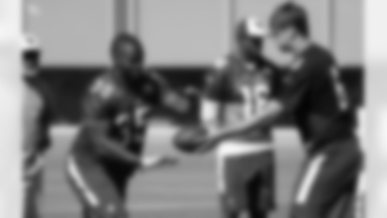 RB Elijhaa Penny and QB Jake Coker