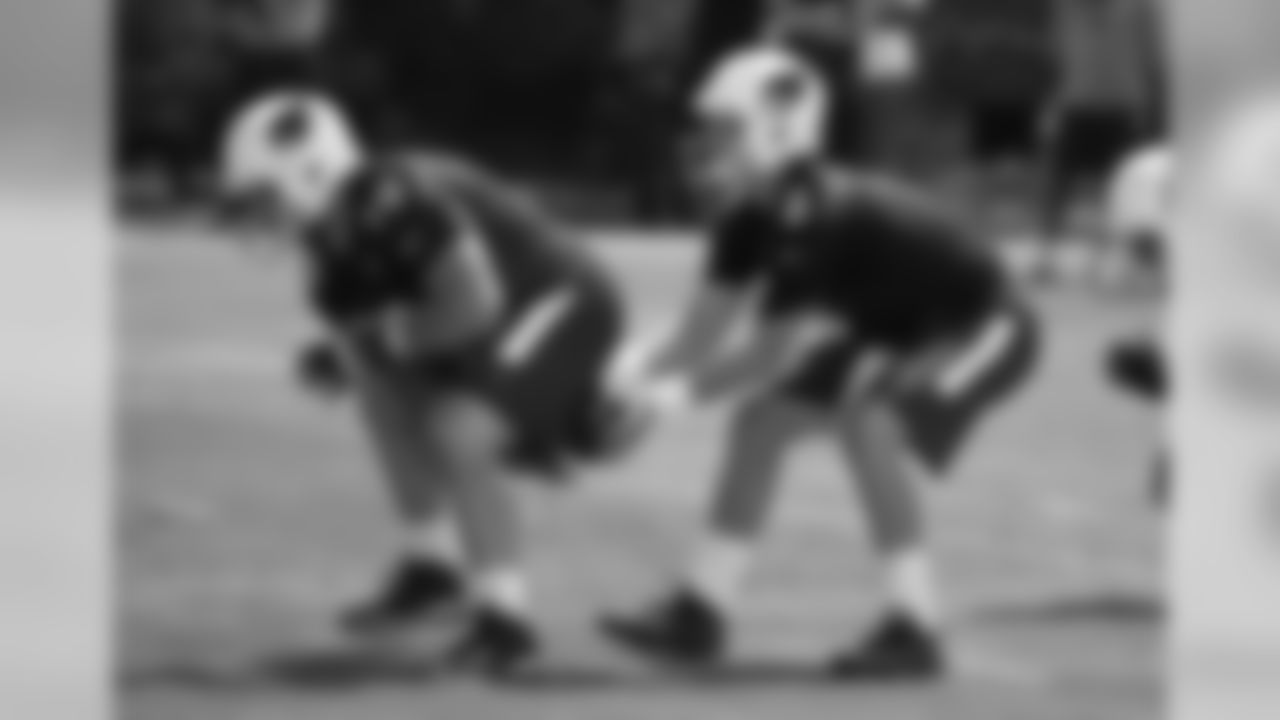 C Evan Boehm snaps to QB Jake Coker