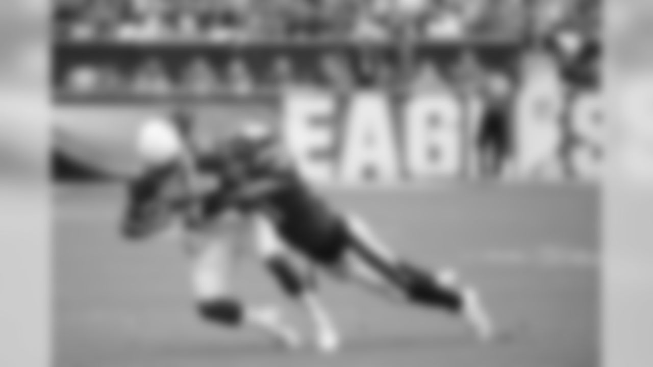 RB Andre Ellington is tackled