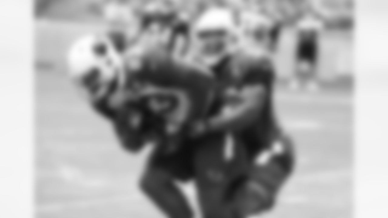 LB Donald Butler tackles TE Gerald Christian