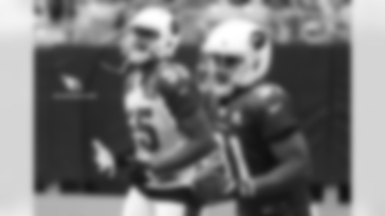 LB Chandler Jones (left) and RB David Johnson
