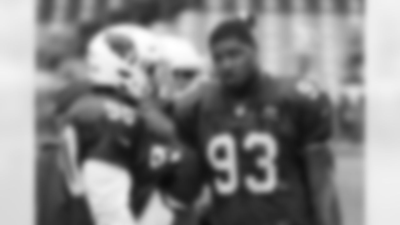 DT Calais Campbell talks with DT Robert Nkemdiche