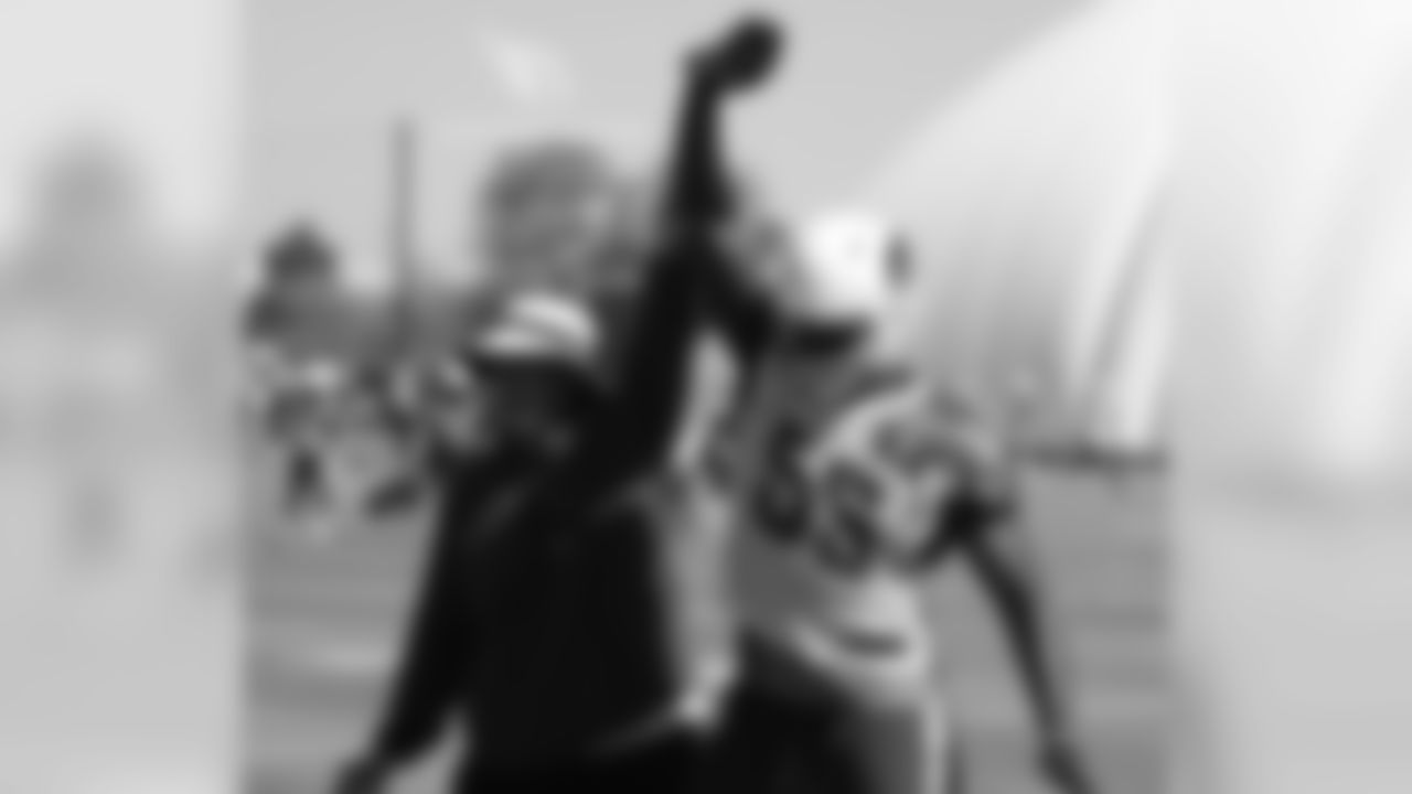 LB coach Bob Sanders teaches LB Chandler Jones