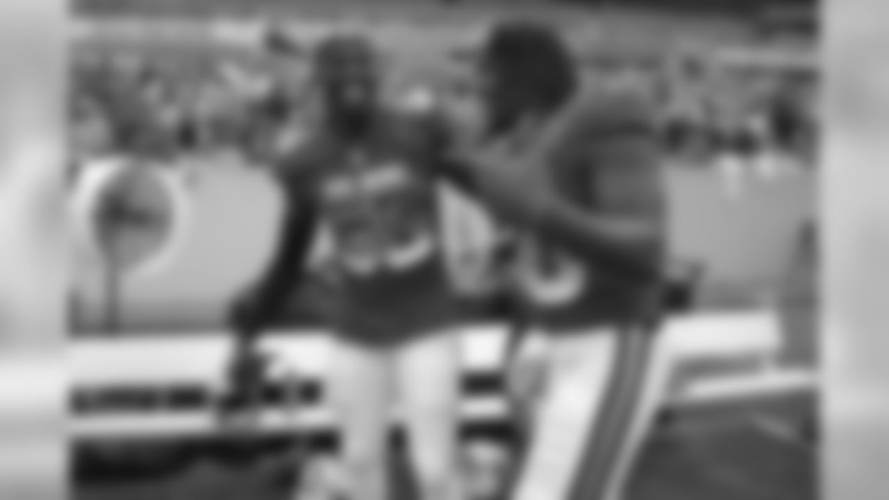 LB Chandler Jones (left) with Cowboys DE DeMarcus Lawrence