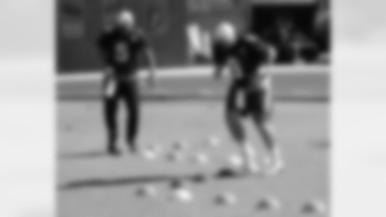 Footwork drills for QB Drew Stanton (left) and QB Matt Barkley