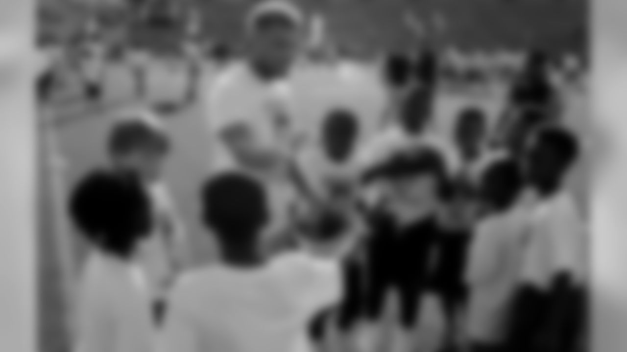 Mathieu talks to some kids