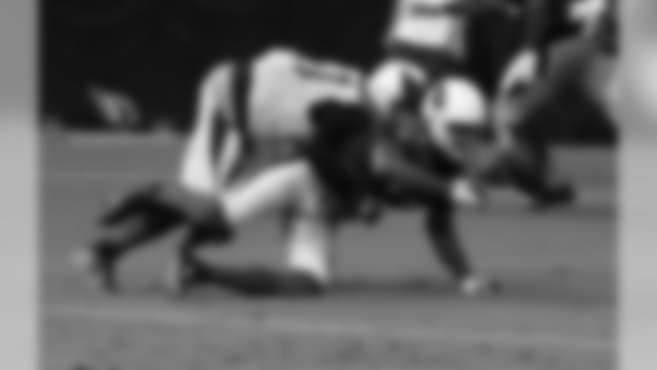 CB Patrick Peterson breaks up a pass to WR Larry Fitzgerald