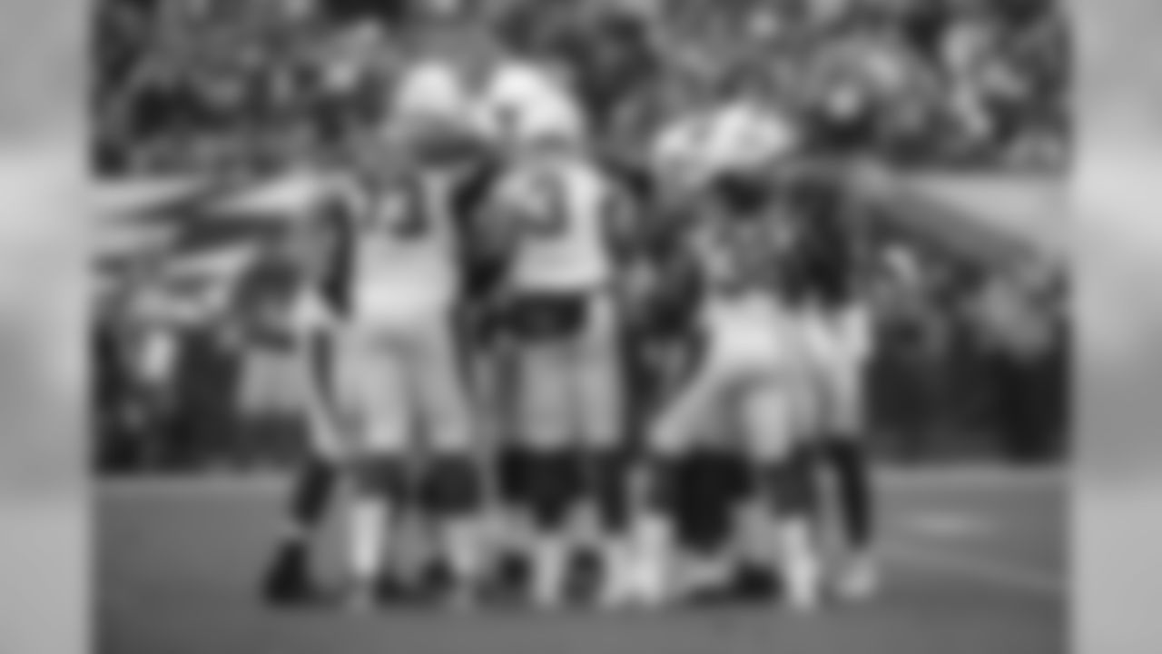 The offense huddles up prior to the play