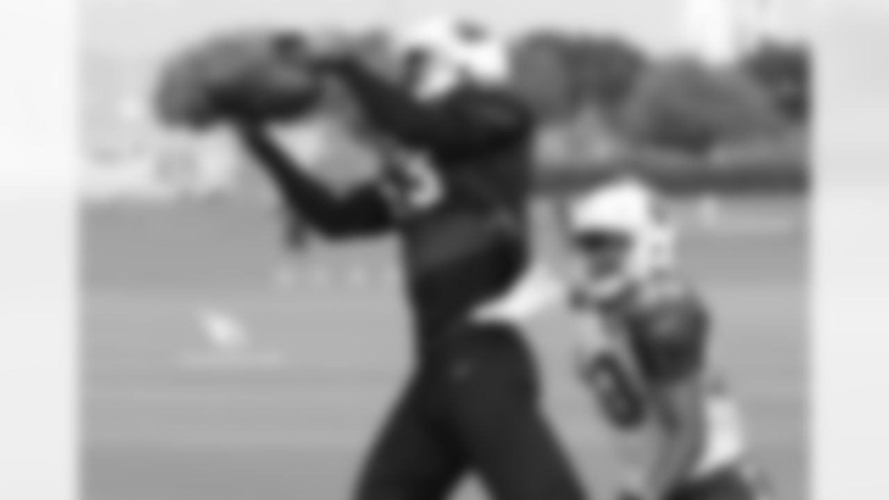 WR Jaron Brown catches a touchdown pass