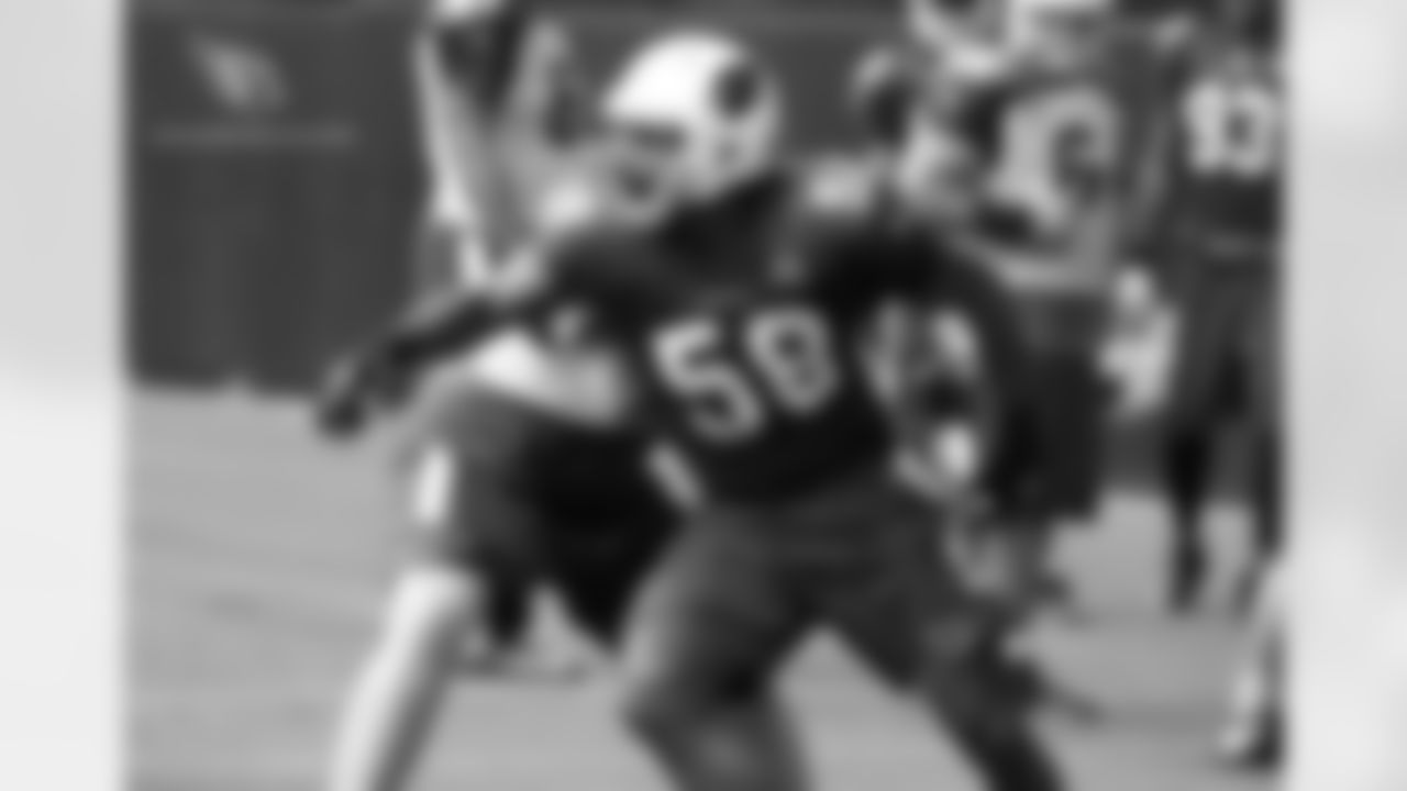 LB Tristan Okpalaugo in a pass-rushing drill