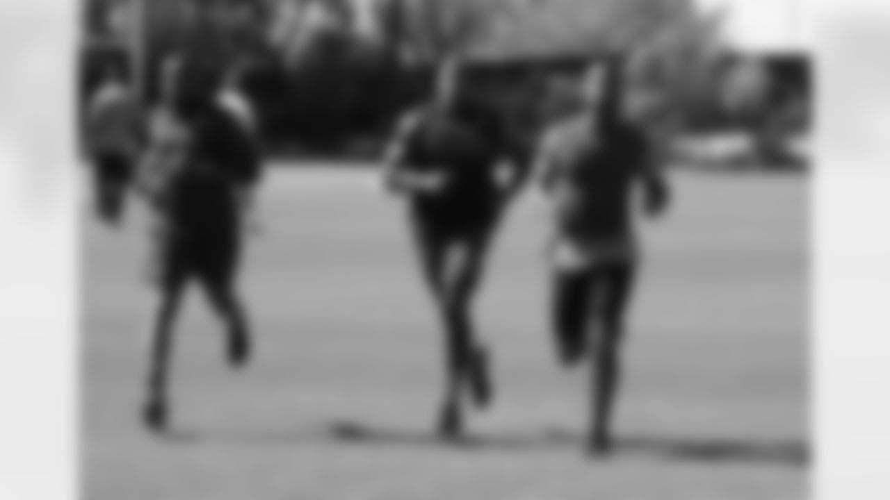 Getting in some running (fron left) are Chris Clemons, Deone Bucannon and Larry Fitzgerald
