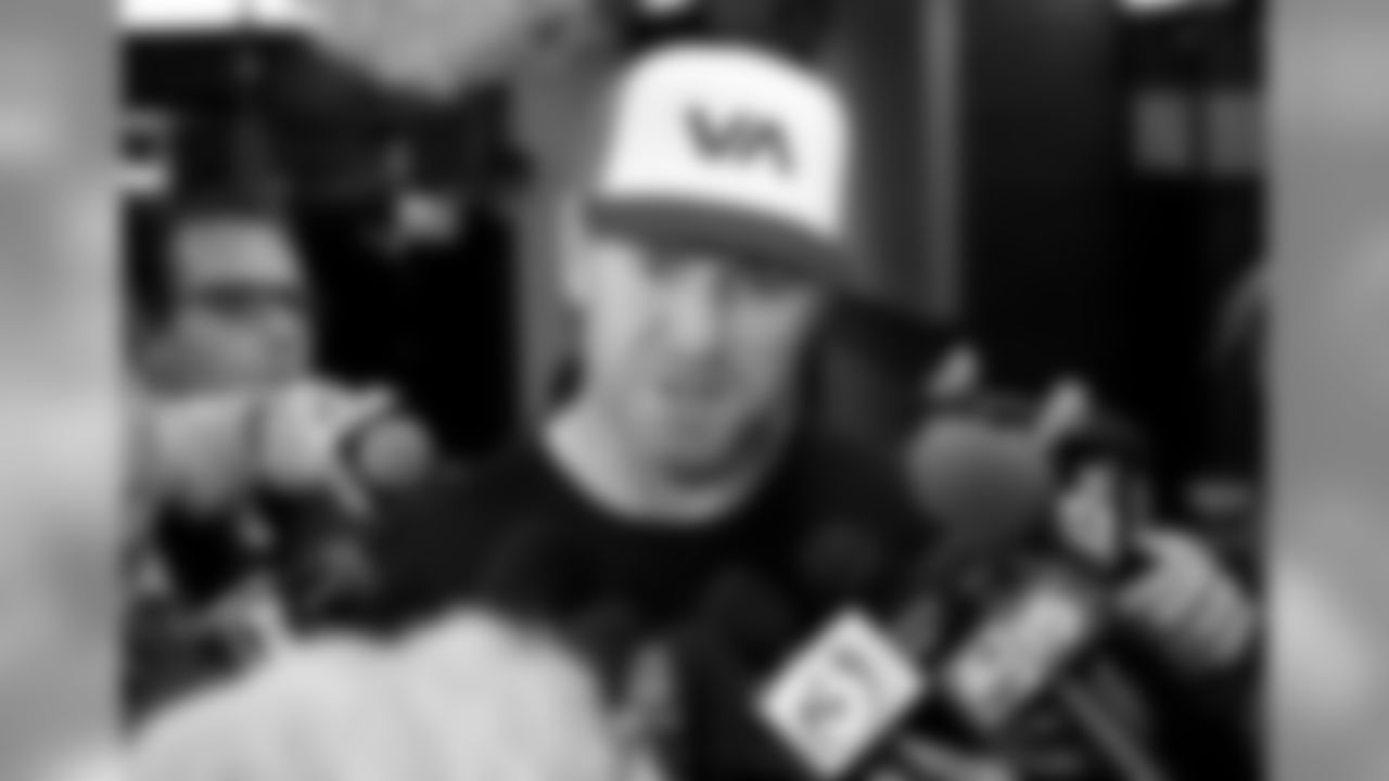 QB Carson Palmer meets with the media