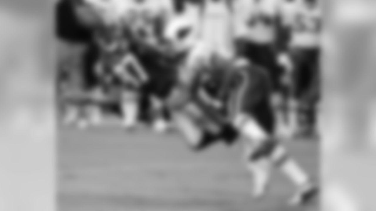 2000: Seahawks WR Derrick Mayes tries to catch a pass as CB Aeneas Williams covers him