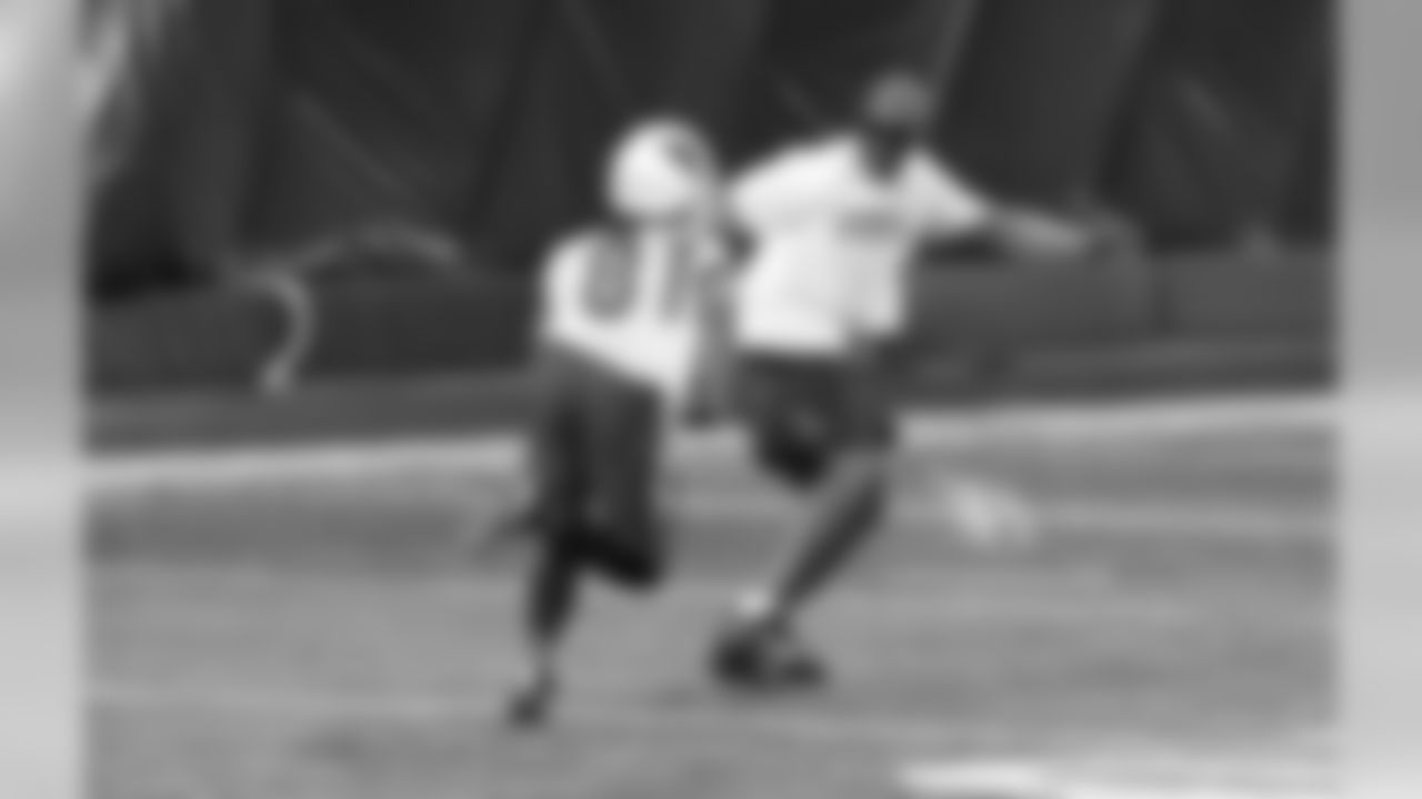 Torry Holt having some fun running with WR Chris Hubert