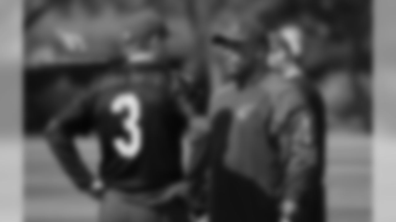 QB Carson Palmer (left) and OC Harold Goodwin