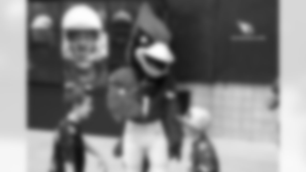 Big Red plays with some young Cardinals fans