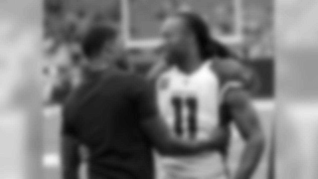 WR Larry Fitzgerald (right) with former Texans star Andre Johnson